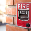 pull fire alarm on building
